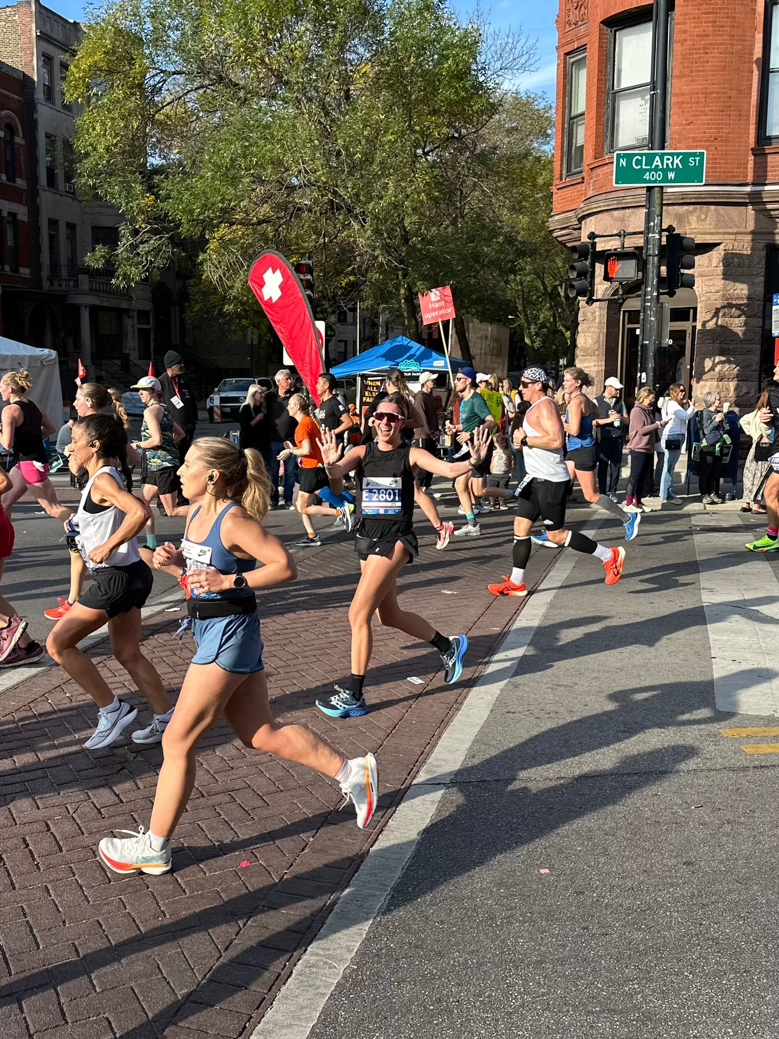 smiling runner mid-marathon race